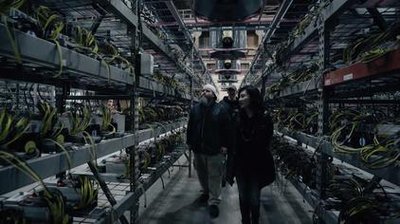 Industrial-scale mining farms with rows of high-performance mining equipment